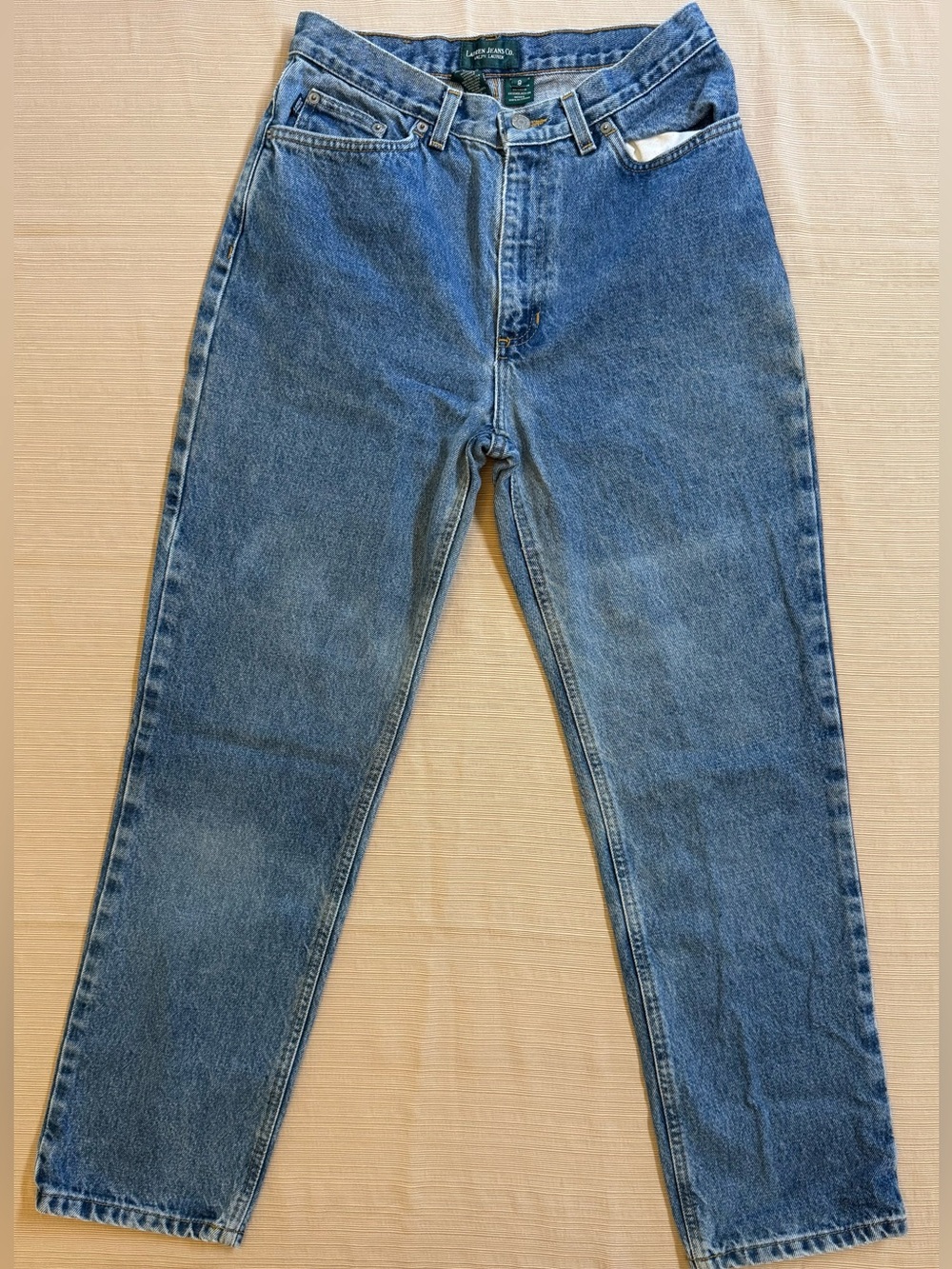 100% cotton 
Ralph Lauren Light Blue Denim Jeans with Golden Stitching
